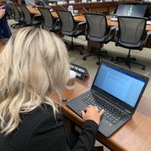 Rachel Emmanuel covering the House of Commons Ethics Committee in West Block.